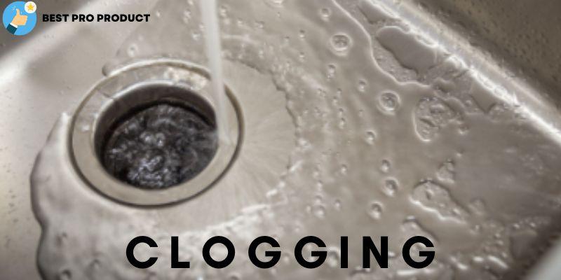 Garbage Disposal Backing Up Into Side Sink Clogging