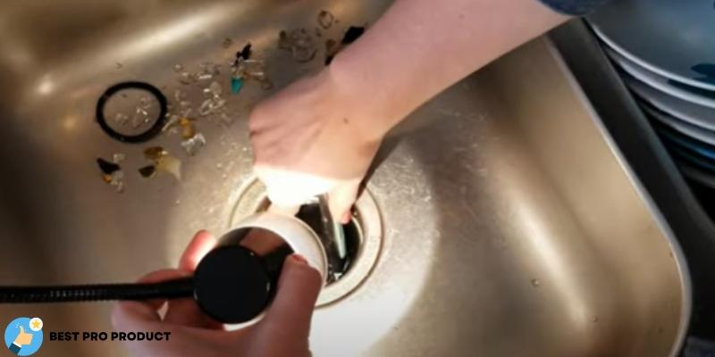 Remove the Large Pieces of glass with Pliers from garbage disposal Garbage Disposal